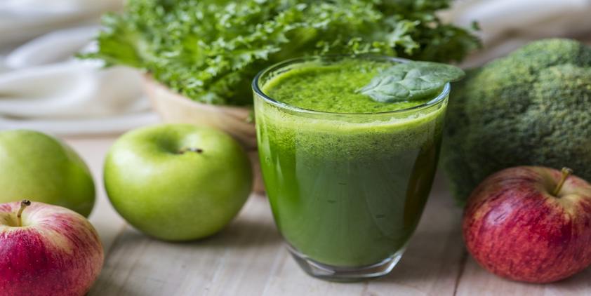 Unsplash. apples, kale, and broccoli on table with green smoothie