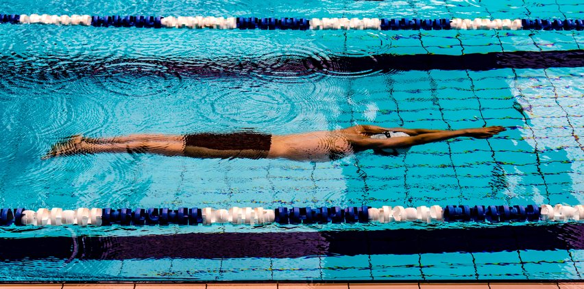 man swimming laps