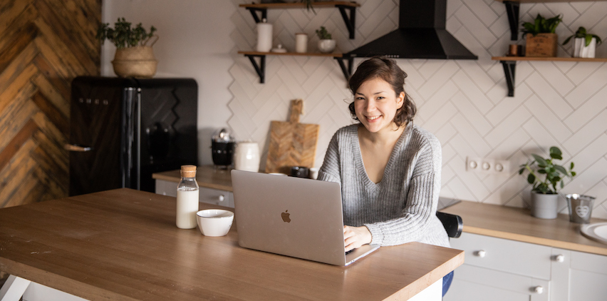 Woman typing on laptop