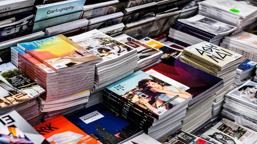 Stacks of various magazines
