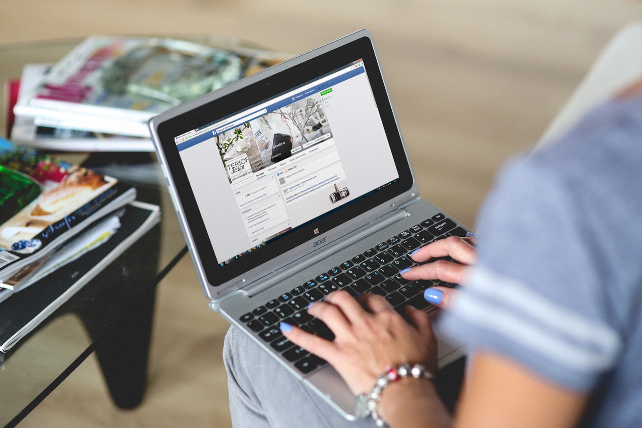 Person typing on a laptop.