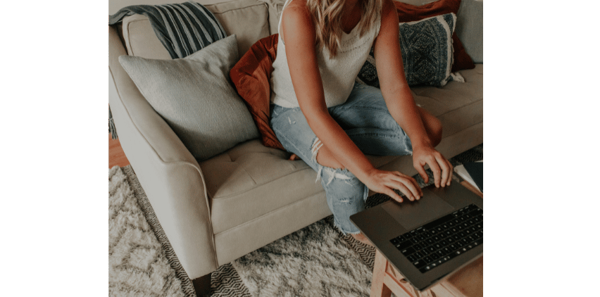 woman typing what is freelance on laptop
