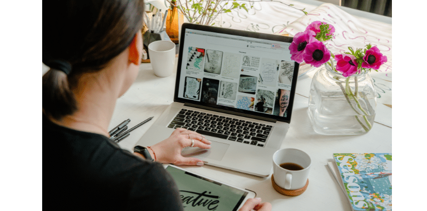 woman designing a freelance writer portfolio website